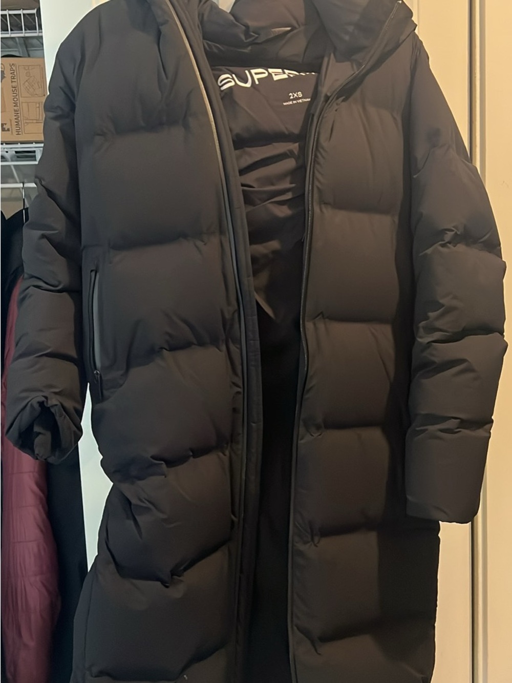 The superpuff2o Women’s Long Black Puffer Coat waterproof puffer